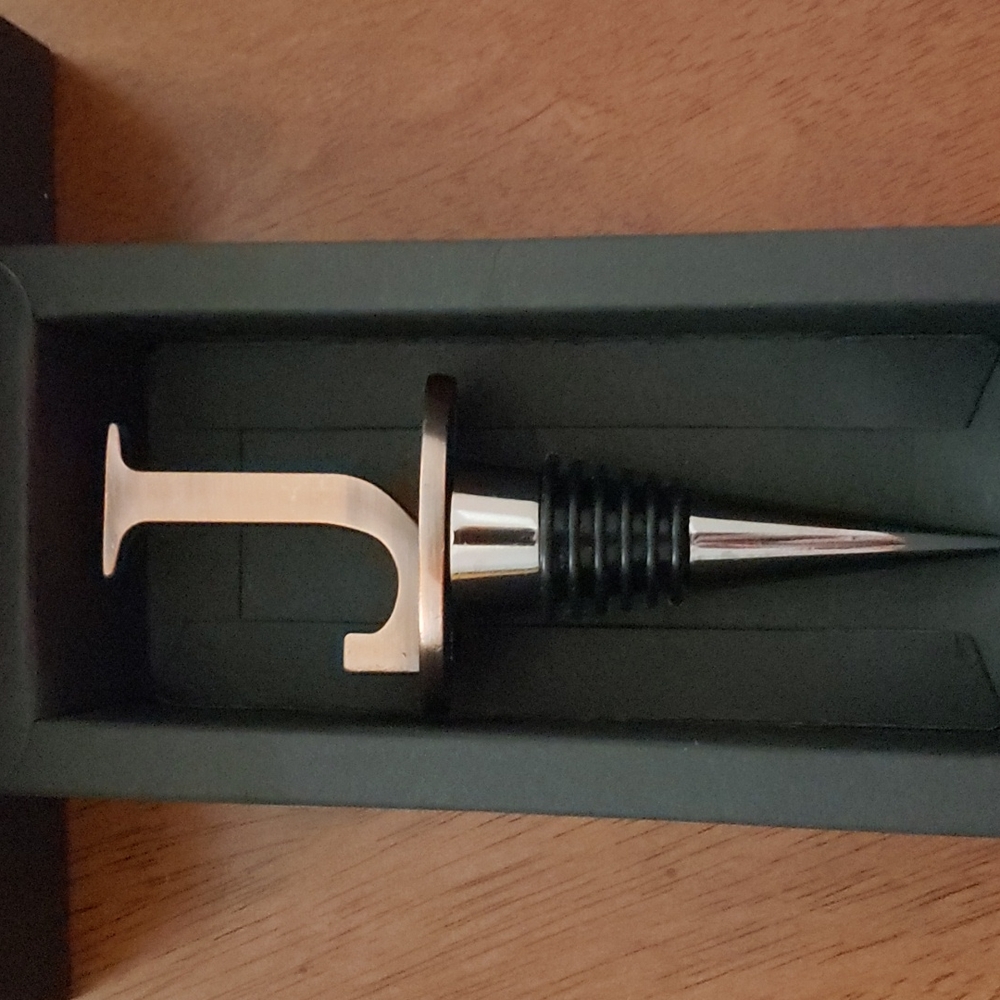 NIB J bottle stopper